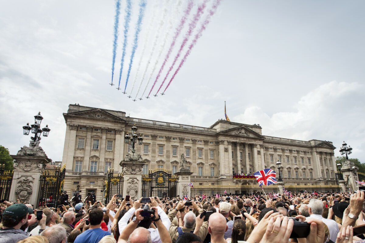 Aerial display flying over crowds above palace