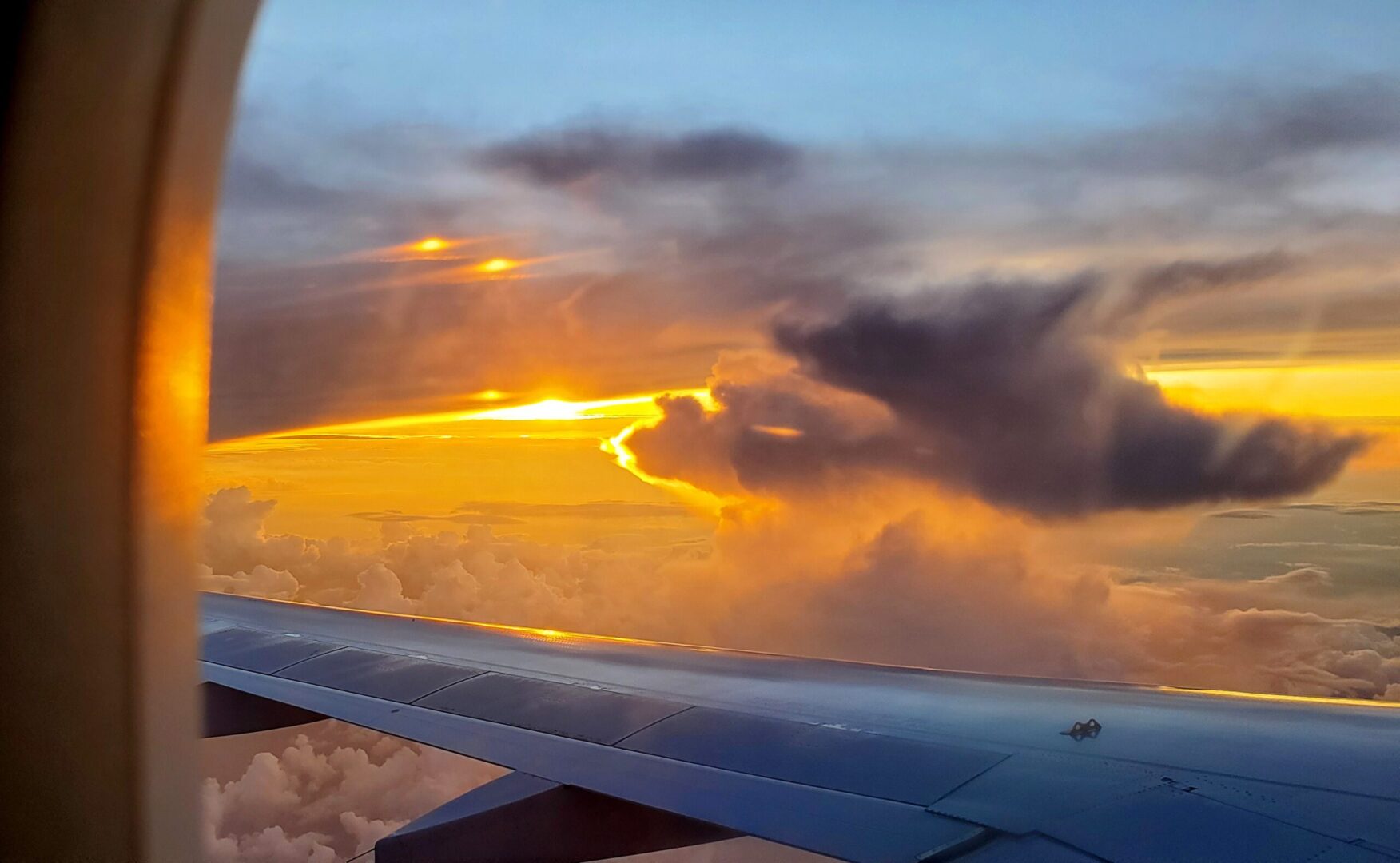 Michael Natto Leaving Myrtle to PIT Allegiant sunset Sunset outside of plane window